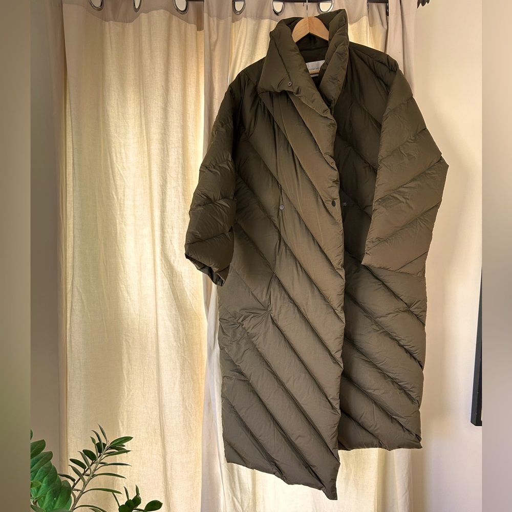 Delightful brand new, never worn, tags on, designer winter coat from Antwerp.